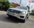 Сірий Фольксваген Тігуан, об'ємом двигуна 1.98 л та пробігом 267 тис. км за 13500 $, фото 1 на Automoto.ua
