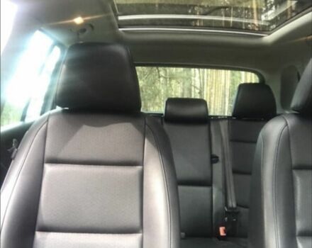 Серый Фольксваген Тигуан, объемом двигателя 2 л и пробегом 209 тыс. км за 12000 $, фото 4 на Automoto.ua