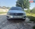 Серый Фольксваген Тигуан, объемом двигателя 1.98 л и пробегом 200 тыс. км за 14000 $, фото 1 на Automoto.ua