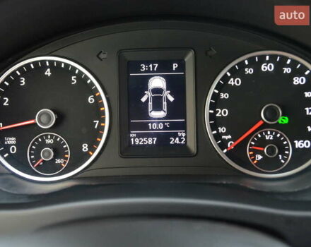 Серый Фольксваген Тигуан, объемом двигателя 1.98 л и пробегом 308 тыс. км за 10800 $, фото 7 на Automoto.ua