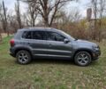 Сірий Фольксваген Тігуан, об'ємом двигуна 2 л та пробігом 175 тис. км за 13500 $, фото 3 на Automoto.ua