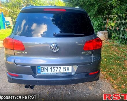 Серый Фольксваген Тигуан, объемом двигателя 2 л и пробегом 190 тыс. км за 14000 $, фото 5 на Automoto.ua