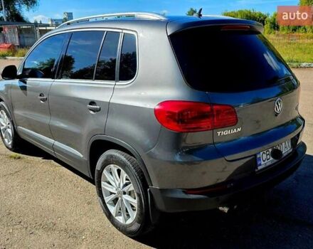 Серый Фольксваген Тигуан, объемом двигателя 1.98 л и пробегом 130 тыс. км за 14400 $, фото 2 на Automoto.ua