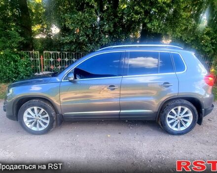 Серый Фольксваген Тигуан, объемом двигателя 2 л и пробегом 190 тыс. км за 14000 $, фото 4 на Automoto.ua