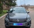 Сірий Фольксваген Тігуан, об'ємом двигуна 2 л та пробігом 175 тис. км за 13500 $, фото 1 на Automoto.ua
