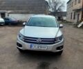 Сірий Фольксваген Тігуан, об'ємом двигуна 2 л та пробігом 148 тис. км за 14200 $, фото 1 на Automoto.ua