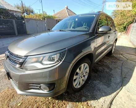 Серый Фольксваген Тигуан, объемом двигателя 1.97 л и пробегом 145 тыс. км за 17500 $, фото 1 на Automoto.ua