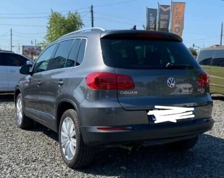 Сірий Фольксваген Тігуан, об'ємом двигуна 2 л та пробігом 166 тис. км за 13900 $, фото 2 на Automoto.ua