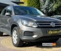 Сірий Фольксваген Тігуан, об'ємом двигуна 2 л та пробігом 243 тис. км за 13200 $, фото 1 на Automoto.ua
