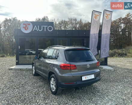 Серый Фольксваген Тигуан, объемом двигателя 2 л и пробегом 170 тыс. км за 12500 $, фото 2 на Automoto.ua