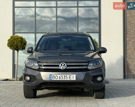 Сірий Фольксваген Тігуан, об'ємом двигуна 2 л та пробігом 176 тис. км за 12400 $, фото 1 на Automoto.ua
