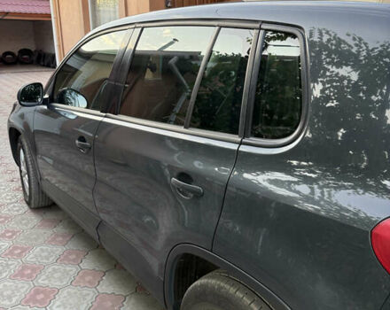 Сірий Фольксваген Тігуан, об'ємом двигуна 1.99 л та пробігом 250 тис. км за 14500 $, фото 1 на Automoto.ua