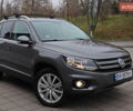 Сірий Фольксваген Тігуан, об'ємом двигуна 2 л та пробігом 150 тис. км за 13999 $, фото 1 на Automoto.ua