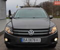 Сірий Фольксваген Тігуан, об'ємом двигуна 2 л та пробігом 150 тис. км за 13999 $, фото 1 на Automoto.ua