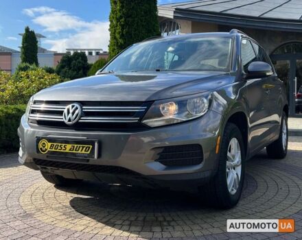 Сірий Фольксваген Тігуан, об'ємом двигуна 2 л та пробігом 243 тис. км за 13200 $, фото 2 на Automoto.ua