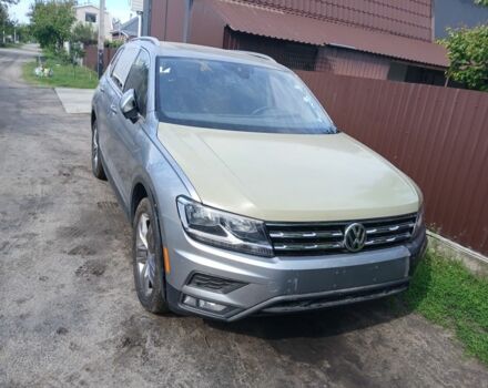 Сірий Фольксваген Тігуан, об'ємом двигуна 1.8 л та пробігом 128 тис. км за 11500 $, фото 1 на Automoto.ua
