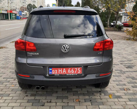 Сірий Фольксваген Тігуан, об'ємом двигуна 2 л та пробігом 206 тис. км за 12600 $, фото 4 на Automoto.ua