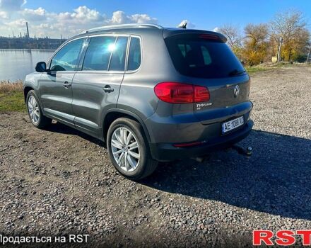 Серый Фольксваген Тигуан, объемом двигателя 2 л и пробегом 195 тыс. км за 13000 $, фото 2 на Automoto.ua