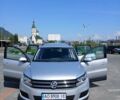 Сірий Фольксваген Тігуан, об'ємом двигуна 1.98 л та пробігом 235 тис. км за 12800 $, фото 2 на Automoto.ua