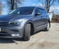 Сірий Фольксваген Тігуан, об'ємом двигуна 2 л та пробігом 140 тис. км за 26500 $, фото 1 на Automoto.ua