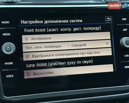 Серый Фольксваген Тигуан, объемом двигателя 2 л и пробегом 263 тыс. км за 18700 $, фото 26 на Automoto.ua