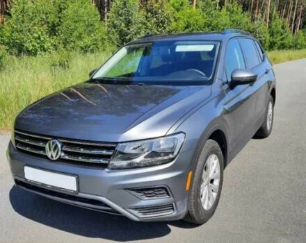 Сірий Фольксваген Тігуан, об'ємом двигуна 2 л та пробігом 105 тис. км за 11000 $, фото 1 на Automoto.ua