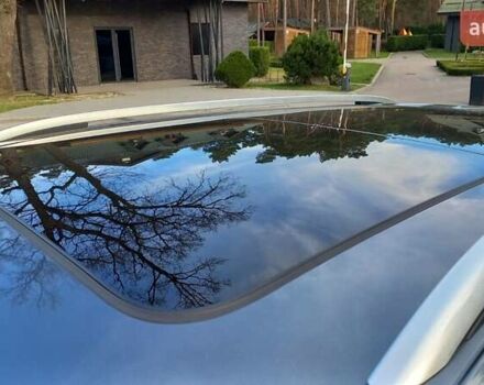 Серый Фольксваген Тигуан, объемом двигателя 2 л и пробегом 147 тыс. км за 23000 $, фото 2 на Automoto.ua