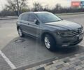Серый Фольксваген Тигуан, объемом двигателя 2 л и пробегом 197 тыс. км за 22900 $, фото 1 на Automoto.ua