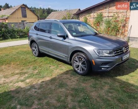Серый Фольксваген Тигуан, объемом двигателя 1.98 л и пробегом 134 тыс. км за 20000 $, фото 1 на Automoto.ua