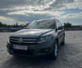 Серый Фольксваген Тигуан, объемом двигателя 1.98 л и пробегом 225 тыс. км за 14000 $, фото 1 на Automoto.ua