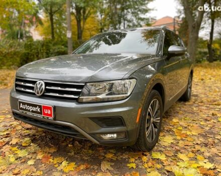 Серый Фольксваген Тигуан, объемом двигателя 2 л и пробегом 205 тыс. км за 16940 $, фото 1 на Automoto.ua