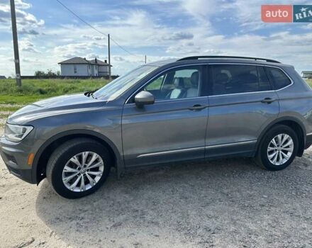 Сірий Фольксваген Тігуан, об'ємом двигуна 1.98 л та пробігом 300 тис. км за 16900 $, фото 4 на Automoto.ua