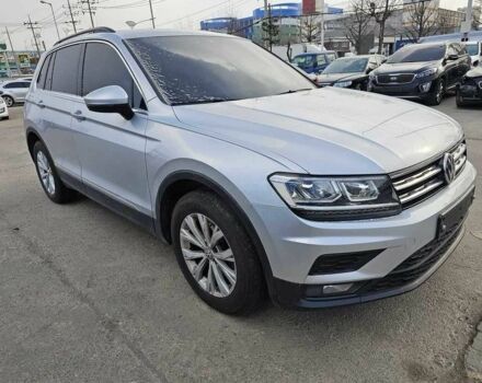 Серый Фольксваген Тигуан, объемом двигателя 2 л и пробегом 67 тыс. км за 20000 $, фото 1 на Automoto.ua