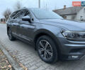 Серый Фольксваген Тигуан, объемом двигателя 2 л и пробегом 169 тыс. км за 21500 $, фото 1 на Automoto.ua
