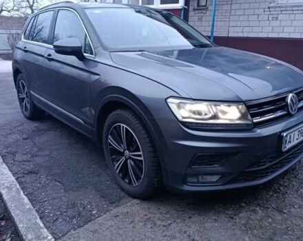 Серый Фольксваген Тигуан, объемом двигателя 2 л и пробегом 210 тыс. км за 21500 $, фото 2 на Automoto.ua