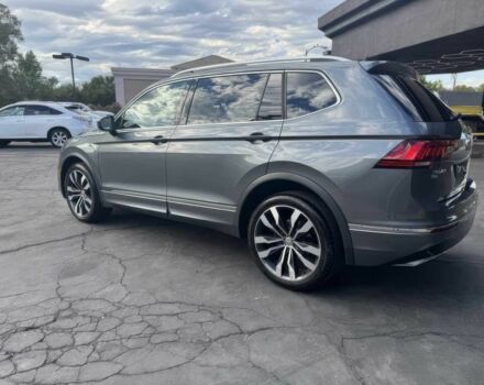 Сірий Фольксваген Тігуан, об'ємом двигуна 2 л та пробігом 38 тис. км за 9000 $, фото 4 на Automoto.ua