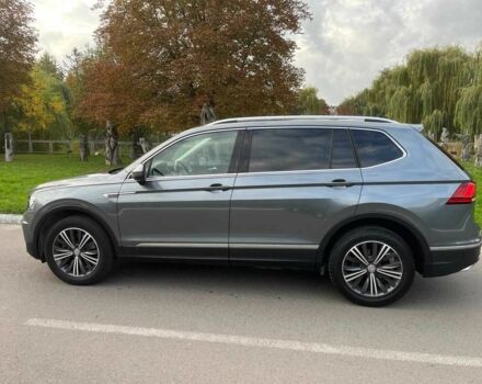 Серый Фольксваген Тигуан, объемом двигателя 2 л и пробегом 135 тыс. км за 18500 $, фото 2 на Automoto.ua