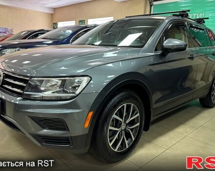 Серый Фольксваген Тигуан, объемом двигателя 2 л и пробегом 189 тыс. км за 19900 $, фото 2 на Automoto.ua