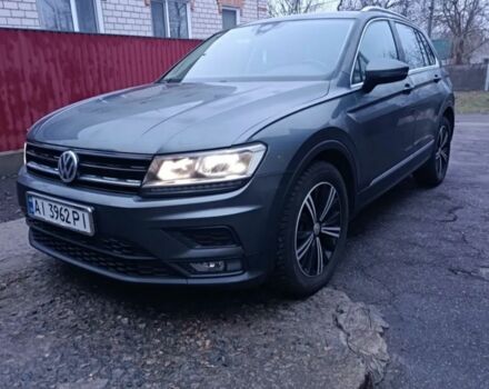 Серый Фольксваген Тигуан, объемом двигателя 2 л и пробегом 210 тыс. км за 21500 $, фото 1 на Automoto.ua