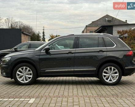 Серый Фольксваген Тигуан, объемом двигателя 2 л и пробегом 143 тыс. км за 29500 $, фото 5 на Automoto.ua