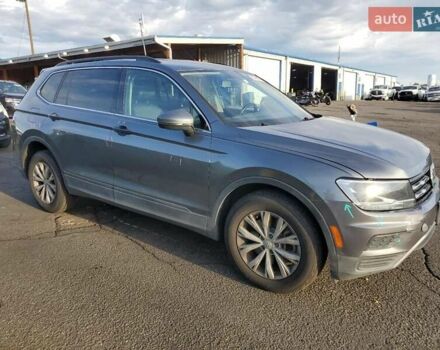 Сірий Фольксваген Тігуан, об'ємом двигуна 2 л та пробігом 154 тис. км за 4800 $, фото 3 на Automoto.ua