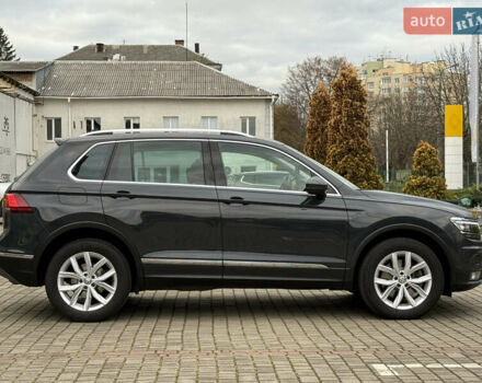 Серый Фольксваген Тигуан, объемом двигателя 2 л и пробегом 143 тыс. км за 29500 $, фото 4 на Automoto.ua