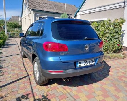 Сірий Фольксваген Тігуан, об'ємом двигуна 2 л та пробігом 143 тис. км за 12700 $, фото 1 на Automoto.ua