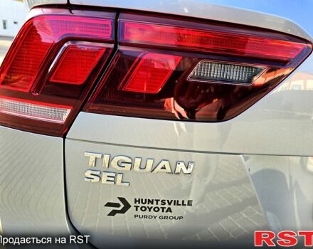 Сірий Фольксваген Тігуан, об'ємом двигуна 2 л та пробігом 147 тис. км за 21950 $, фото 2 на Automoto.ua