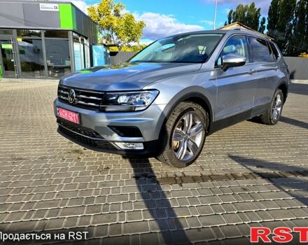 Сірий Фольксваген Тігуан, об'ємом двигуна 2 л та пробігом 147 тис. км за 21950 $, фото 4 на Automoto.ua