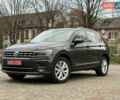 Серый Фольксваген Тигуан, объемом двигателя 2 л и пробегом 143 тыс. км за 29500 $, фото 1 на Automoto.ua