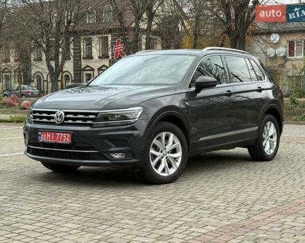 Серый Фольксваген Тигуан, объемом двигателя 2 л и пробегом 143 тыс. км за 29500 $, фото 1 на Automoto.ua