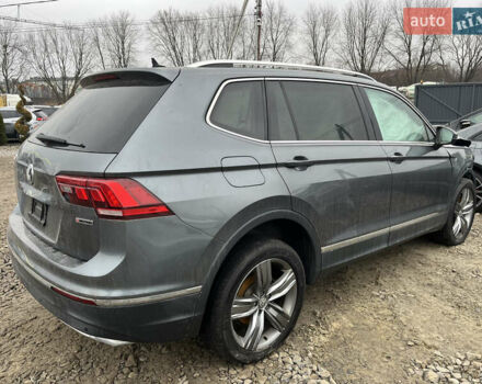 Сірий Фольксваген Тігуан, об'ємом двигуна 2 л та пробігом 176 тис. км за 13500 $, фото 4 на Automoto.ua