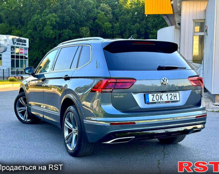 Серый Фольксваген Тигуан, объемом двигателя 2 л и пробегом 237 тыс. км за 28950 $, фото 2 на Automoto.ua