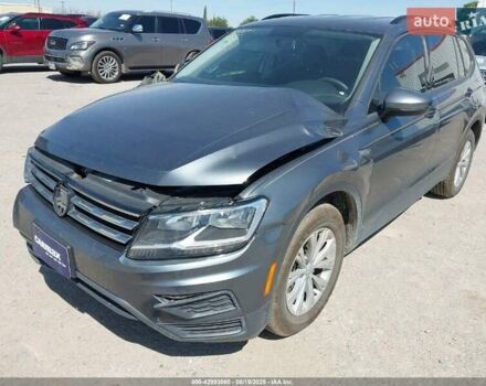 Сірий Фольксваген Тігуан, об'ємом двигуна 2 л та пробігом 74 тис. км за 11390 $, фото 1 на Automoto.ua